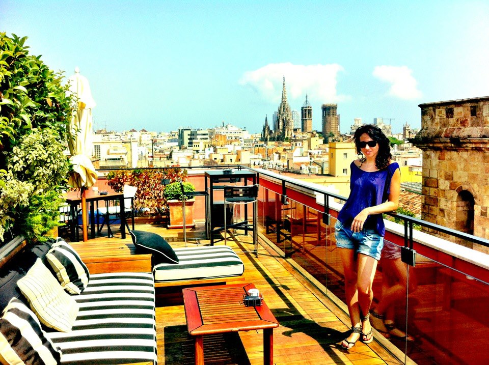 Rooftop Terrace at Hotel 1898 on Las Ramblas Barcelona with the views of the city in the background Rooftop Terrace at Hotel 1898 on Las Ramblas Barcelona with the views of the city in the background