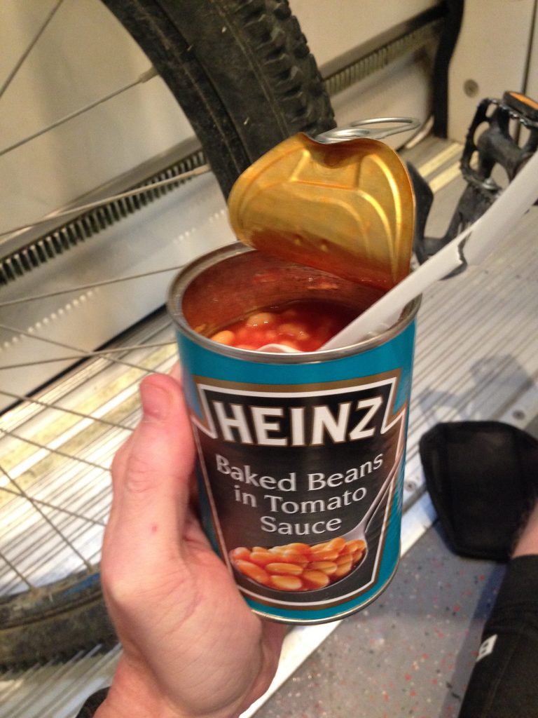 Eating the damn tin of beans on the train