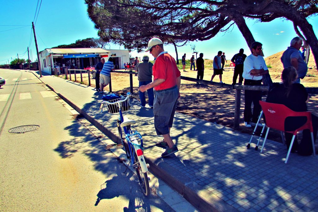 Old man on a bike on the Costa Brava