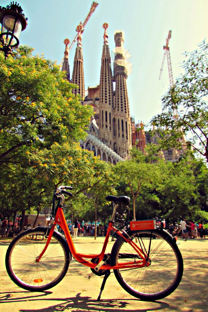 Orange Donkey Republic rental bike at La Sagrada Familia in Barcelona