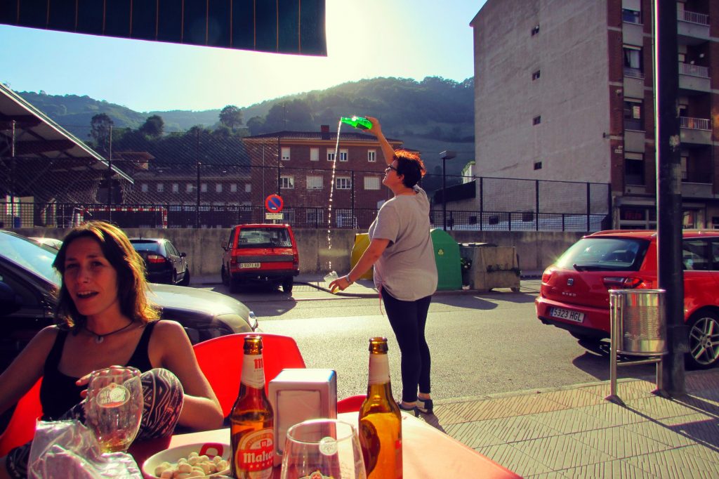 traditional-long-cider-pouring-in-pola-de-llena-in-asturias-northern-spain