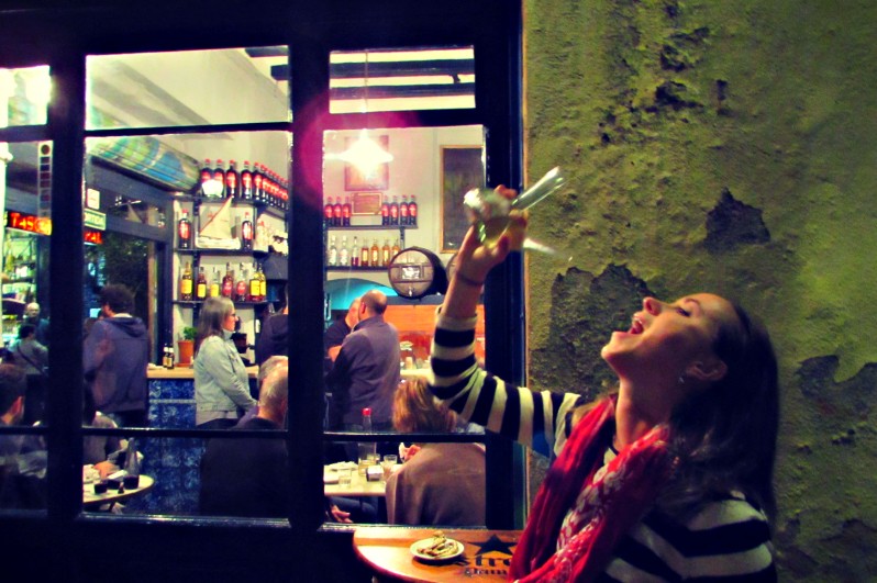 Drinking wine from a Spanish porron
