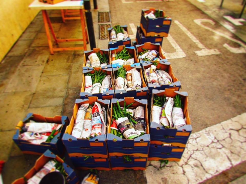 Boxes of Calcots waiting be be barbecued in Sants, Barcelona Calcotada