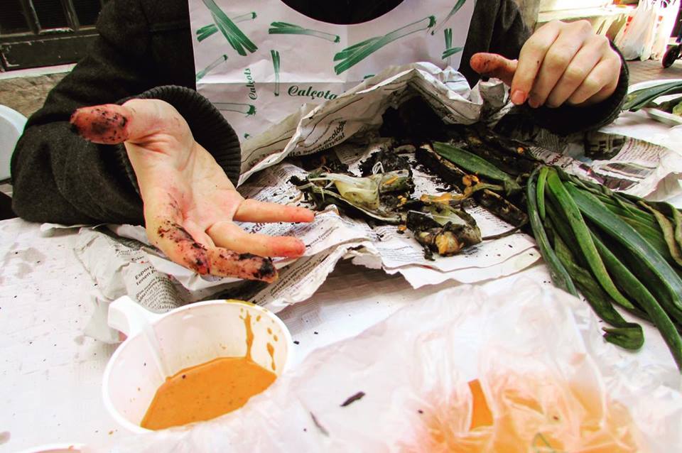 Eating Catalan calcots in Barcelona