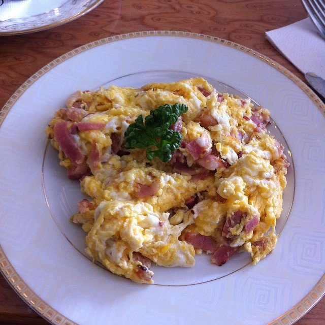 Kielbasa and scrambled eggs for Breakfast at Krakow, Poland