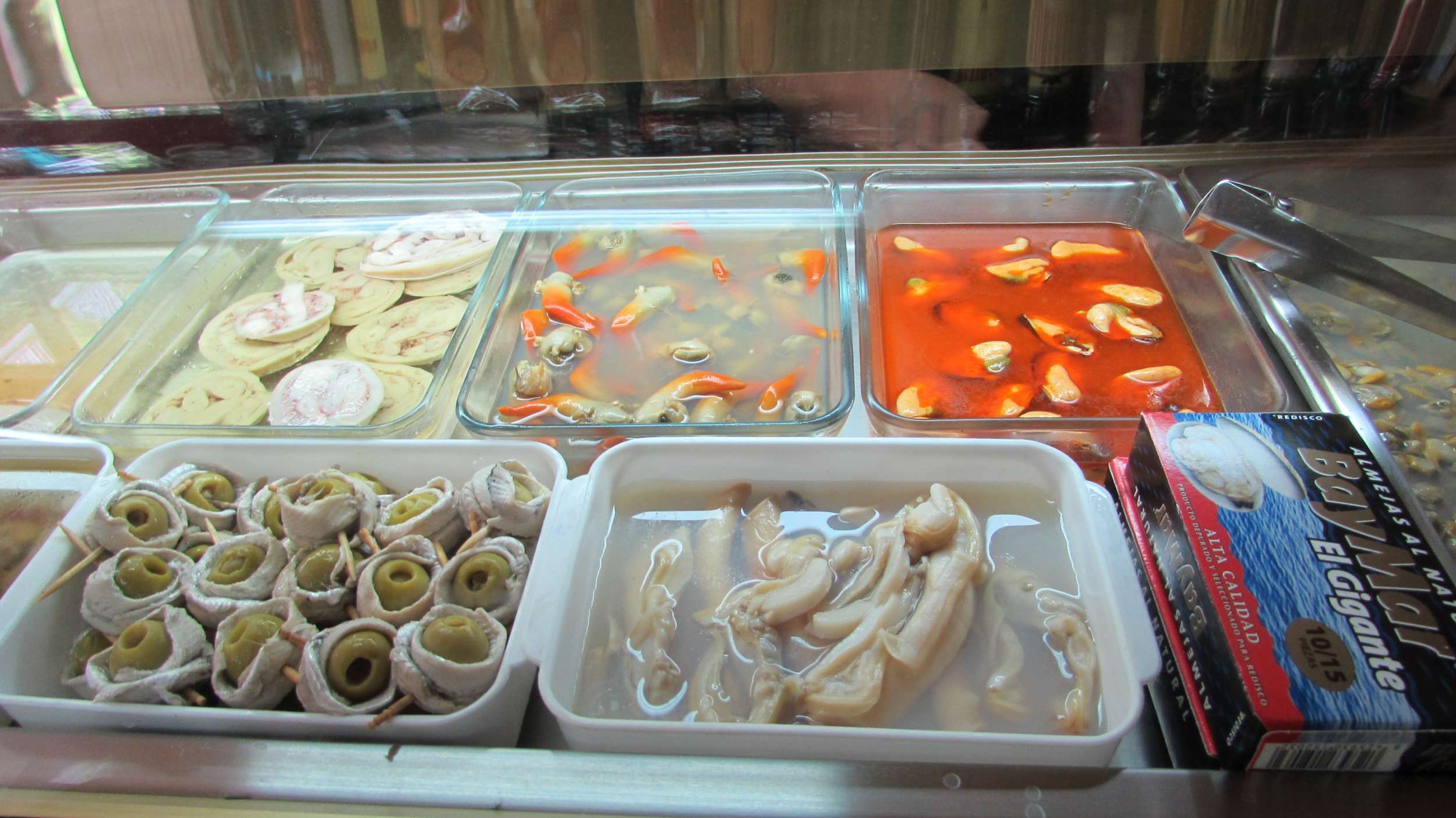 Catalan food and tapas at At the bar in Barcelona's best Vermouth bar: La Vermuteria del Tano Gracia Barcelona