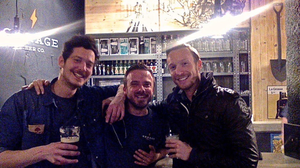 Ben Holbrook travel writer with the owners of Garage Beer Co. craft beer bar Barcelona