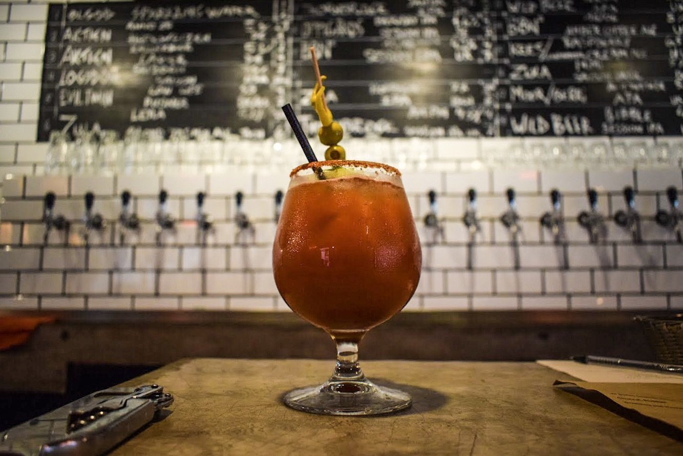 Michelada Mexican beer cocktail at Olgod Craft beer bar in Raval, Barcelona