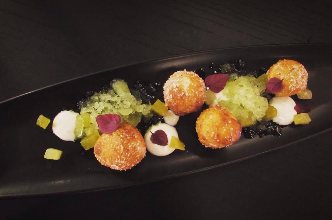 buñuelos”, which are little doughy balls with aniseed, praline, white chocolate and a sort of pineapple ice-slushy sauce. at NaparBCN Barcelona