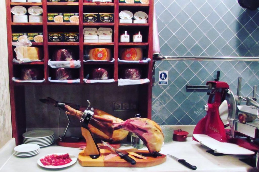 Jamon waiting to be sliced in a traditional bar and restaurant in Born, Barcelona
