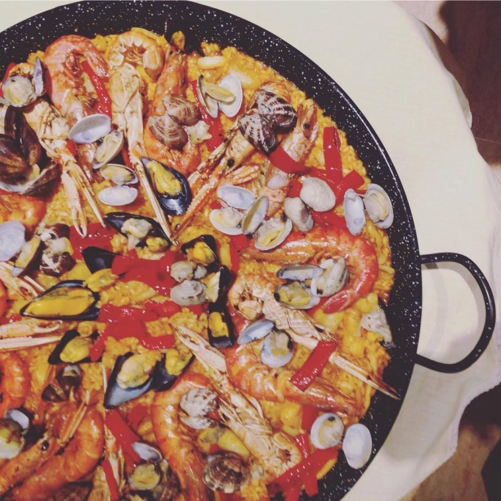 Eating home cooked paella at a chef's house in Barcelona