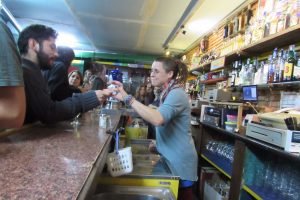 Bartender at Party people at Mariachi Bar Gothic Quarter Barcelona