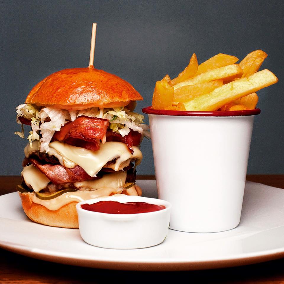Double cheese burger with bacon and cheddar at Caravelle in Raval Barcelona