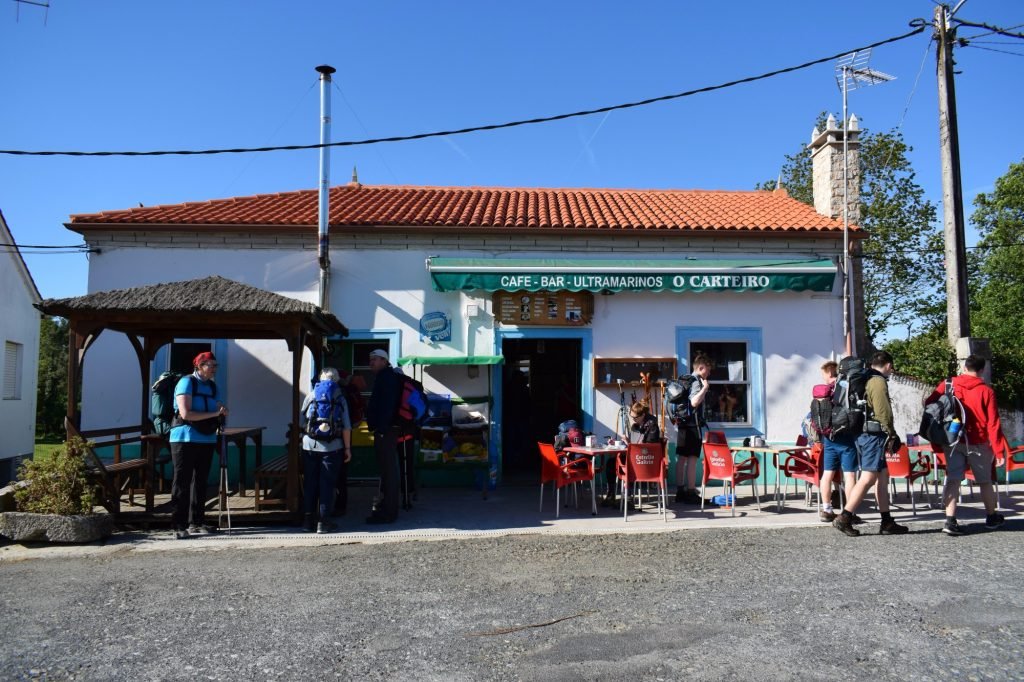 Hikers resting at a Hospitalero (cafe bar) along the Camino de Santiago in Galicia