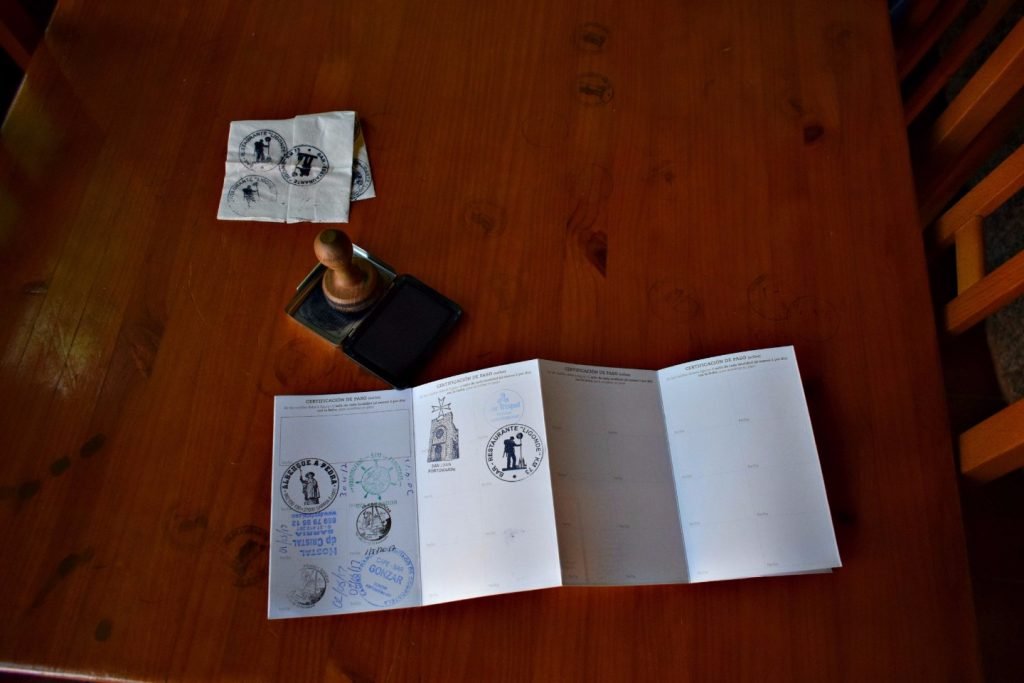 Stamping my passport on the Camino de Santiago