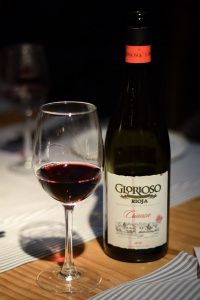A glass and bottle of Spanish Rioja red wine - Barcelona Food Experiences Food Tour