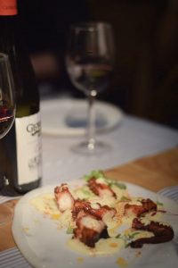Crispy 'pulpo' octopus served on a bed of creamy mashed potato - Barcelona Food Experiences