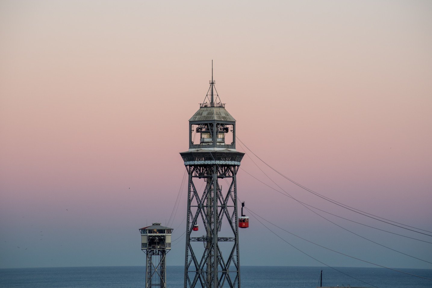 Barcelona's iconic cable car at sunset
