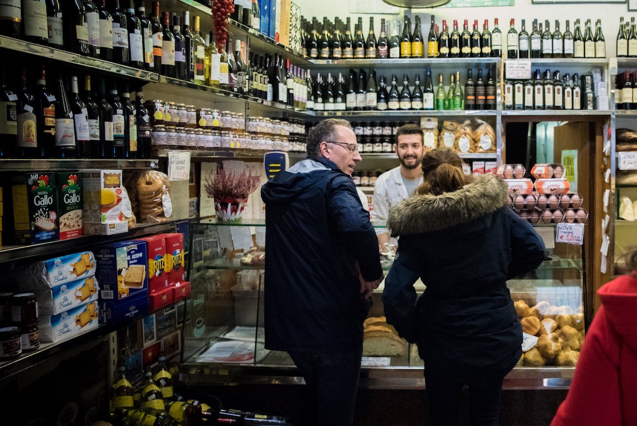 Cheese shop in Rome's Trastevere neighbourhood - by Ben Holbrook