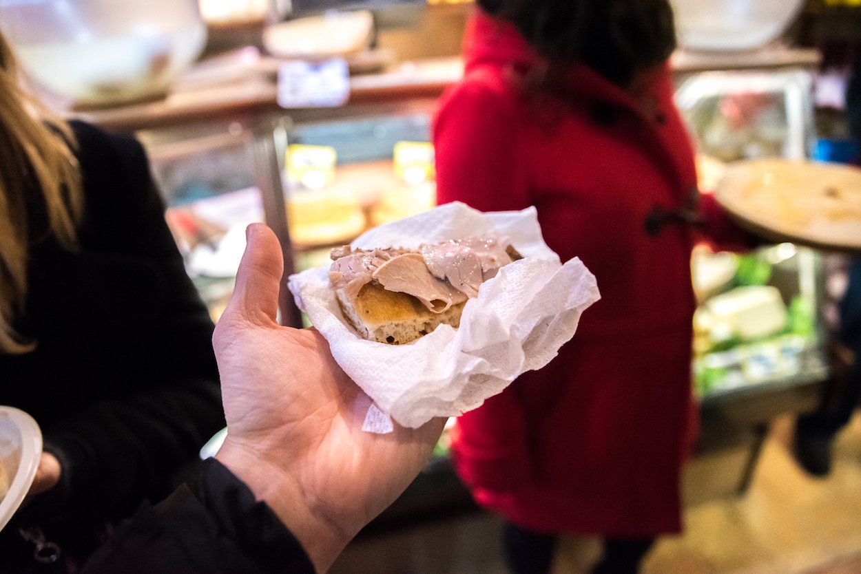Eating porchetta on Eating Italy's 'Trastevere for Foodies' food tour in Rome.