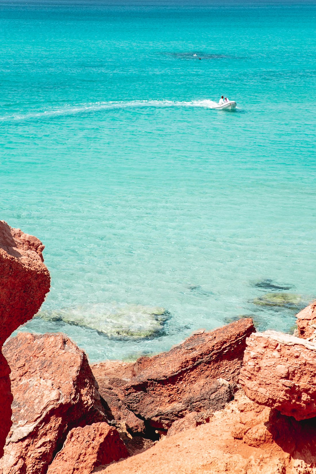 Turquoise waters and Mars-red rocks at Cala Saona, Formentera - Travel Guide by Ben Holbrook Turquoise waters and Mars-red rocks at Cala Saona, Formentera - Travel Guide by Ben Holbrook