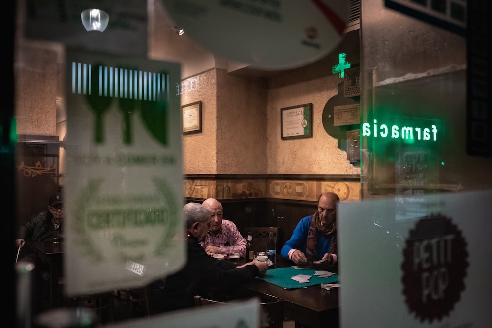 Asturian men playing cards in an old bar in Gijon. Asturian men playing cards in an old bar in Gijon.