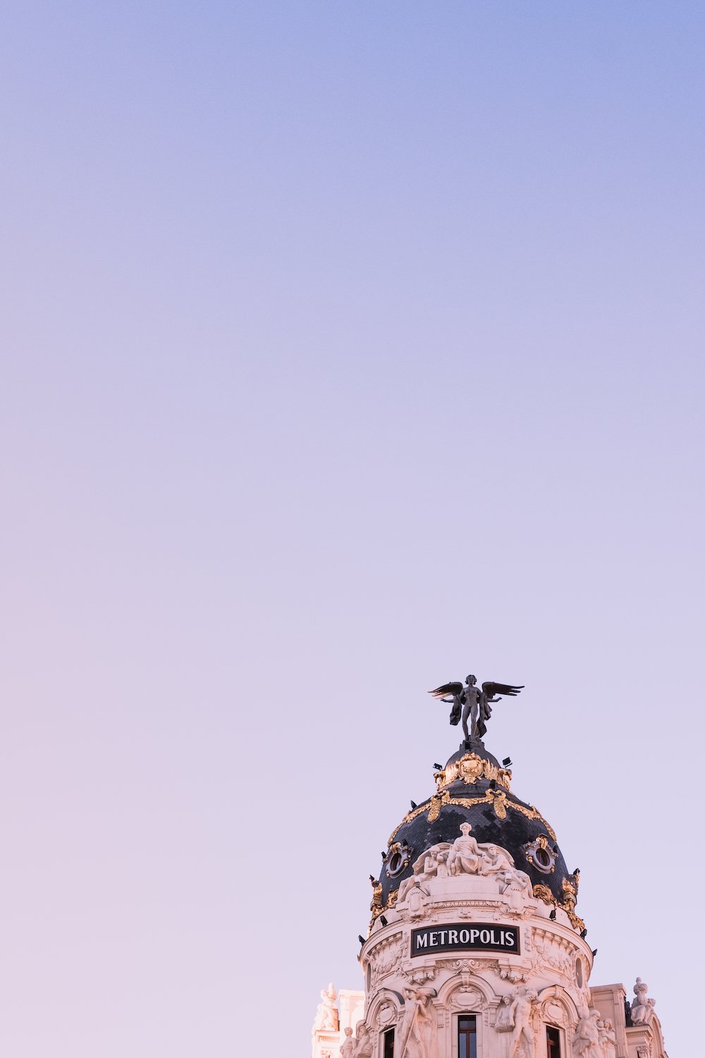 Madrid's iconic Metropol building - Street Photography Essay - by Ben Holbrook DriftwoodJournals.com-9686