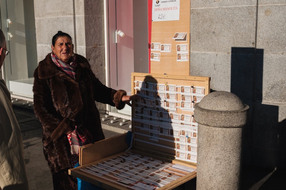 Lottery Ticket Seller, Madrid Street Photography Essay - by Ben Holbrook DriftwoodJournals.com-9718