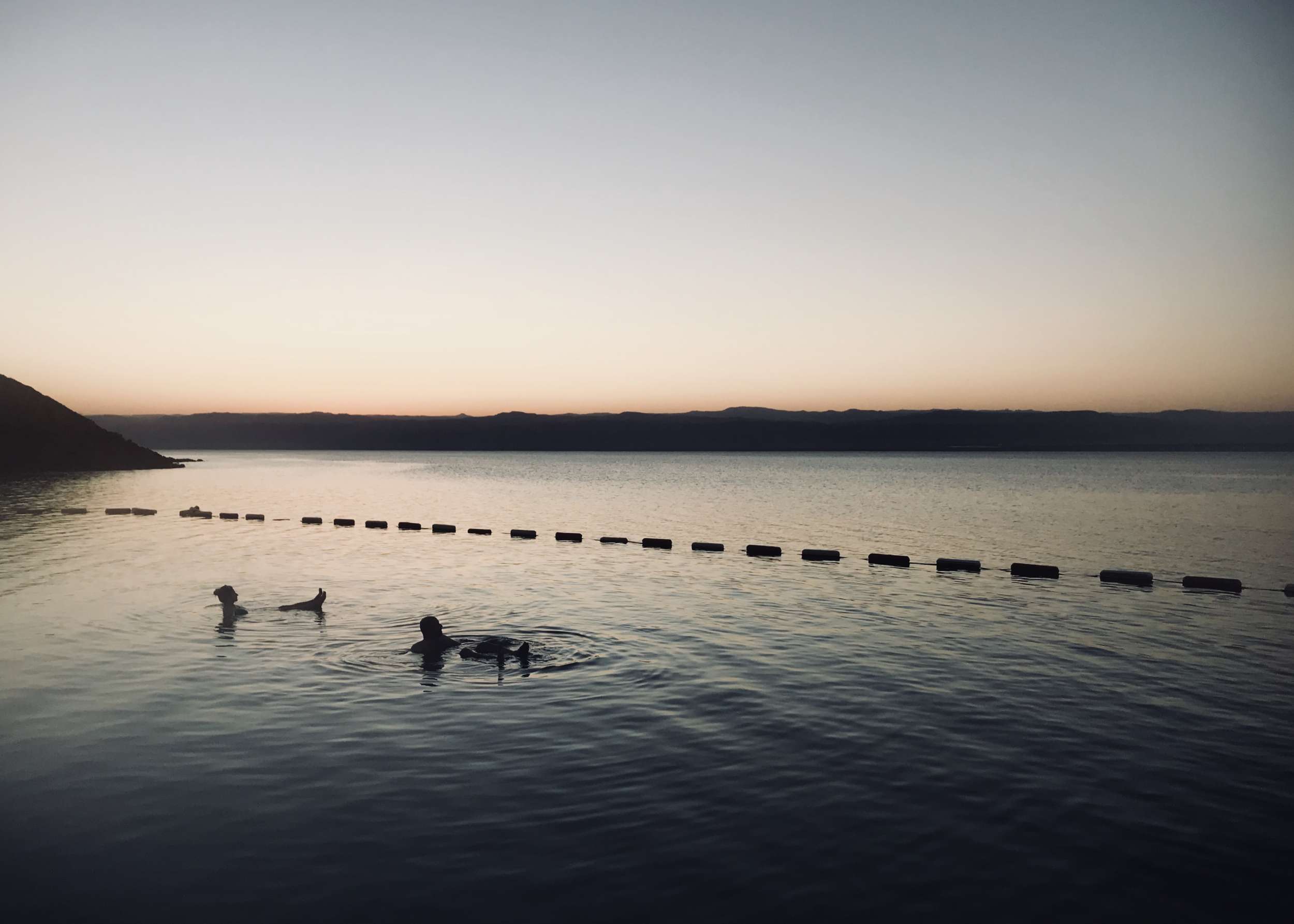 floating in the Dead Sea, Jordan.