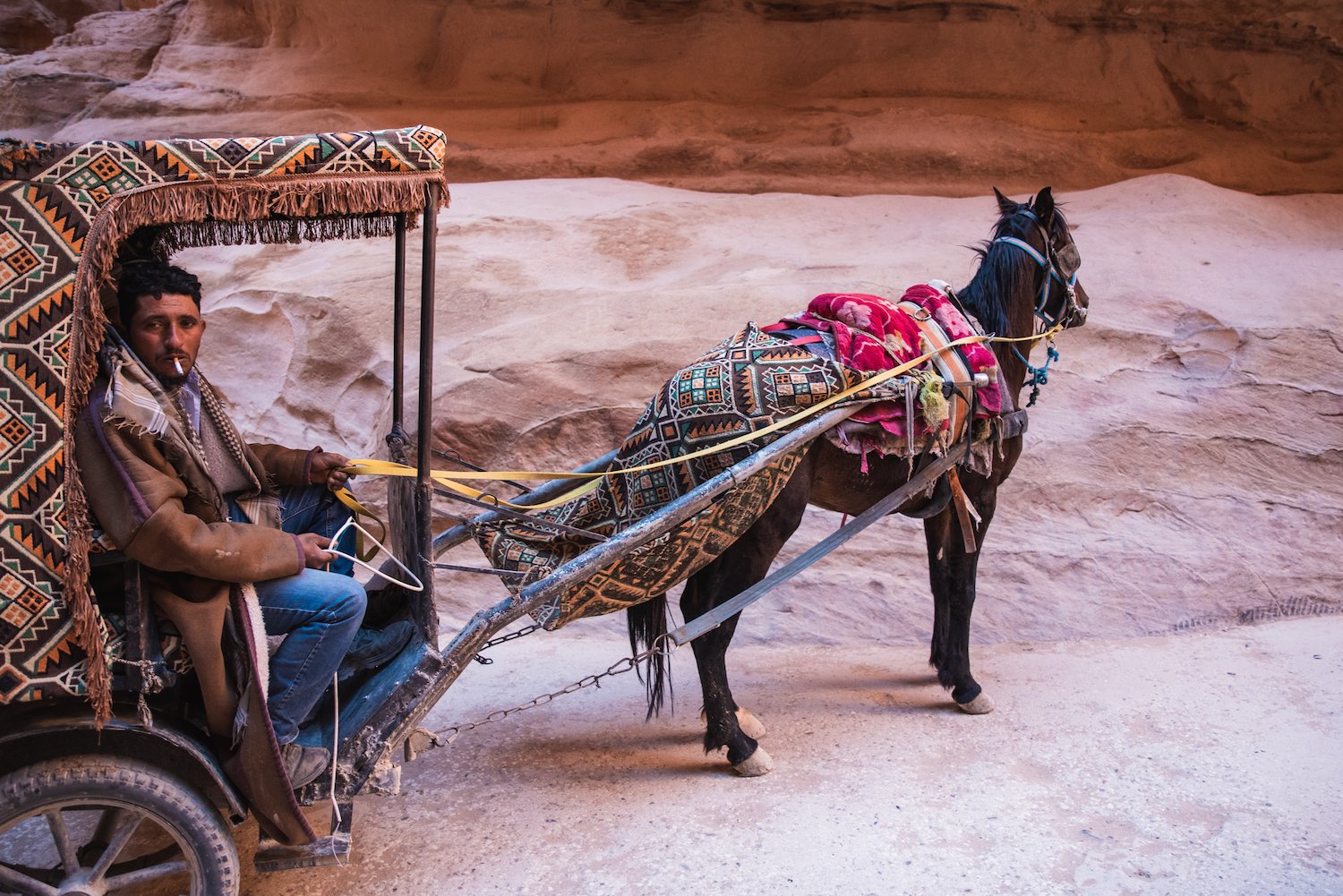 Horse tax rider on the path to Petra, Jordan, Middle East Travel Guide Blog and Photography by Ben Holbrook from DriftwoodJournals.com