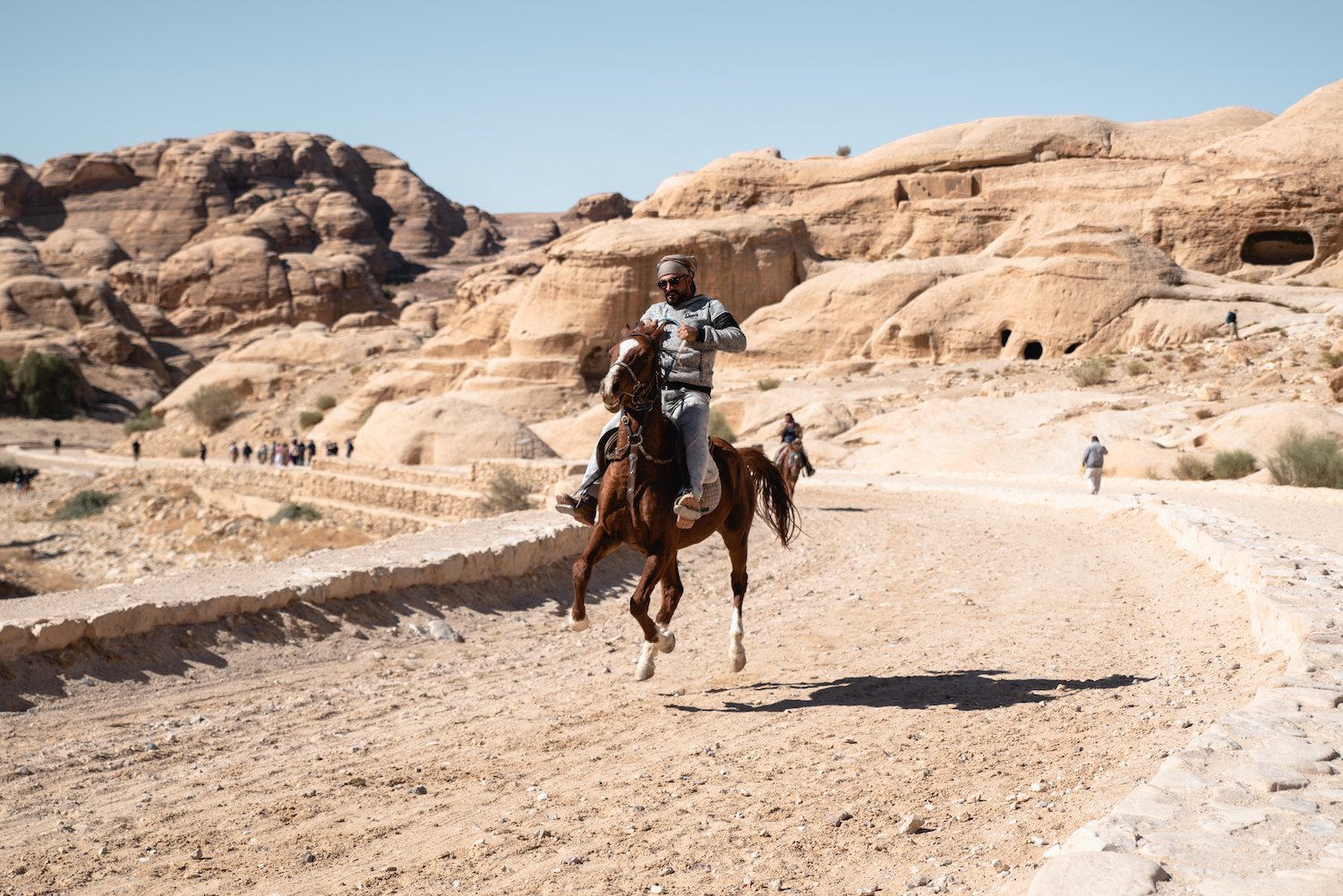Petra horse taxi rider - by Ben Holbrook from DriftwoodJournals.com