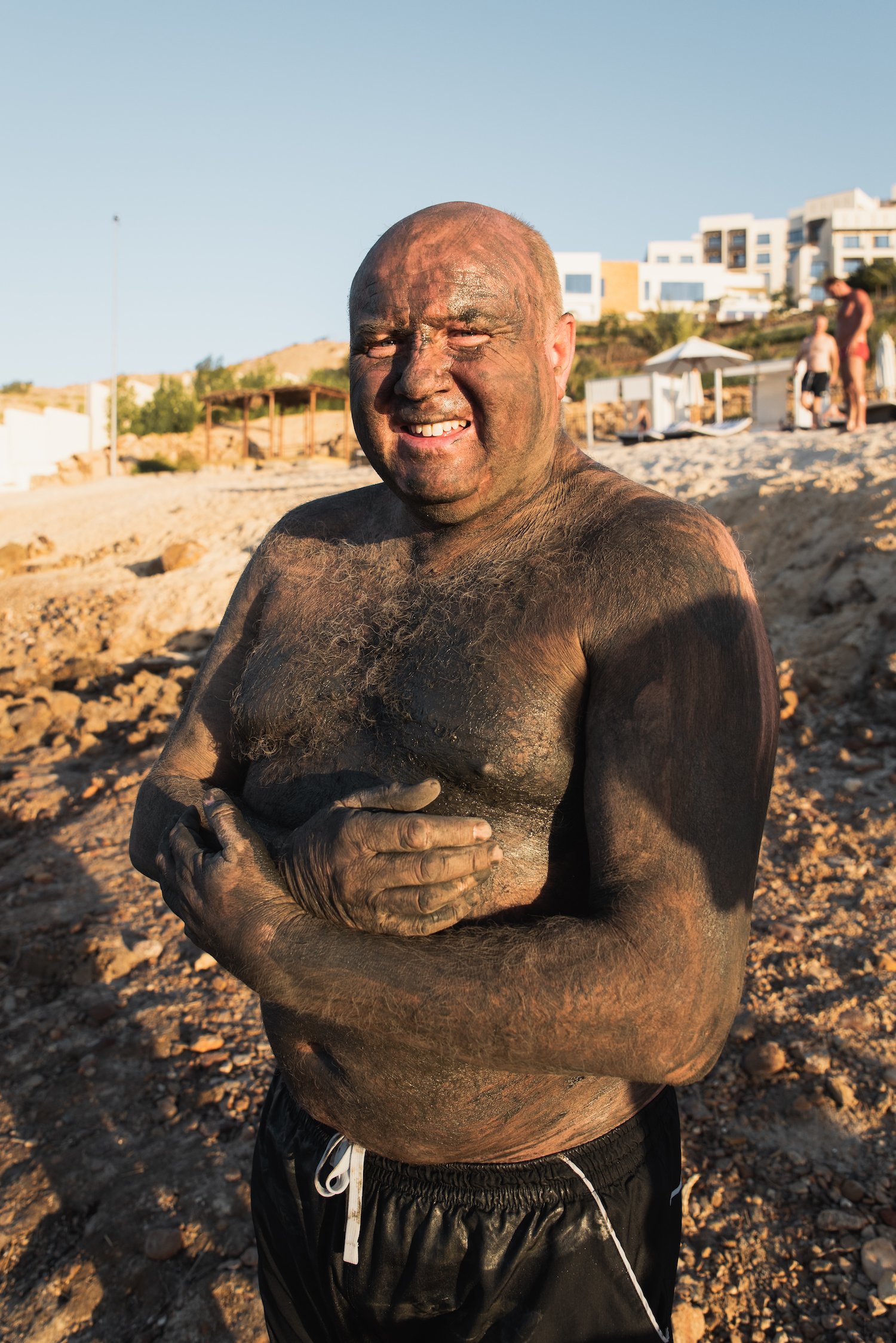 Mud bath and bathe, Dead Sea, Jordan. 