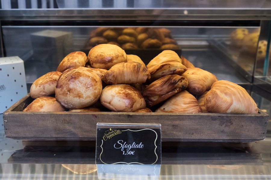 Traditional sfogliatella’ in Naples Spanish Quarter - by Ben holbrook