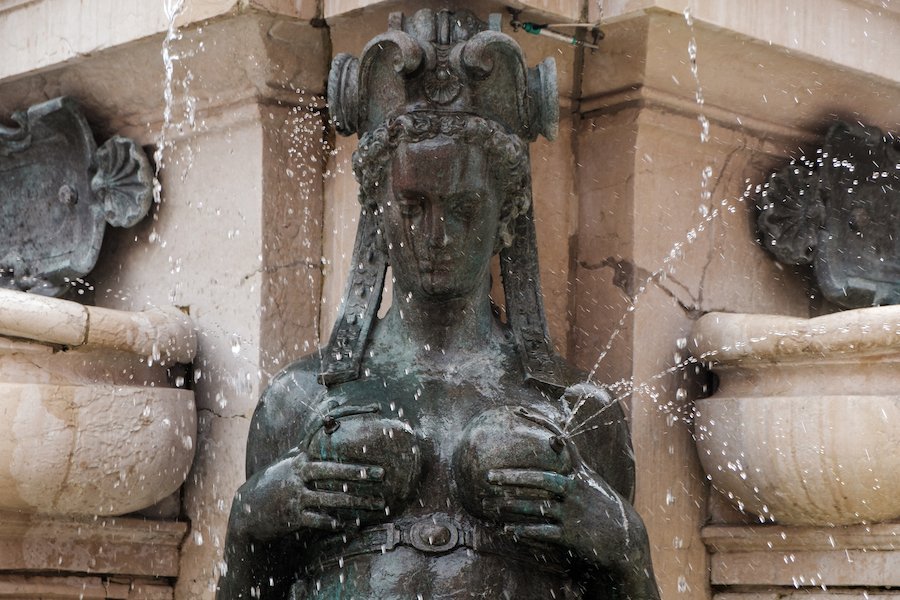 Piazza Nettuno, Neptune Fountain - Bologna, Italy Things to Do – Travel Photography by Ben Holbrook from DriftwoodJournals.com19