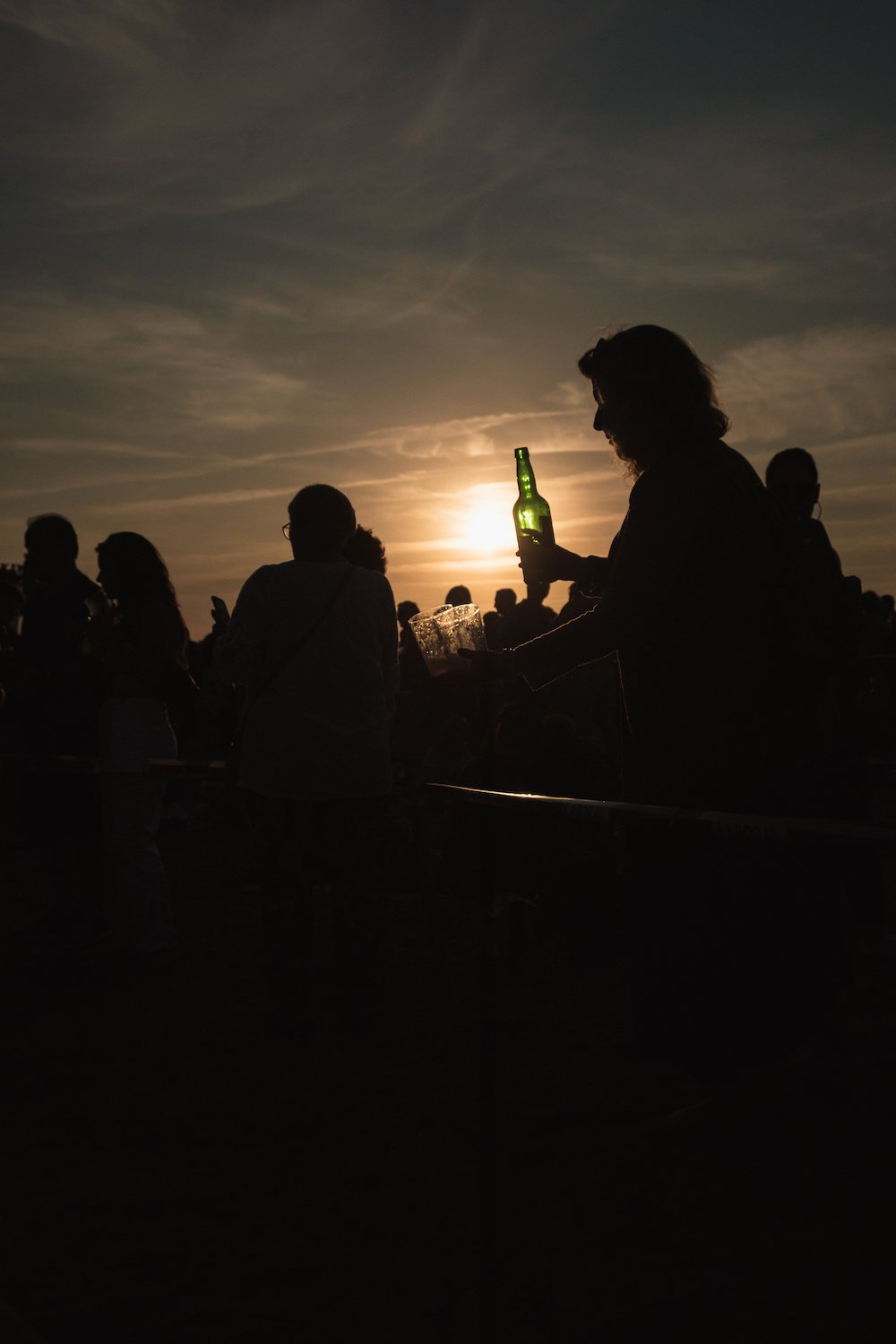 Sidra pouring world record at sunset in Gijon, Asturias, northern Spain by Ben Holbrook from DriftwoodJournals.com