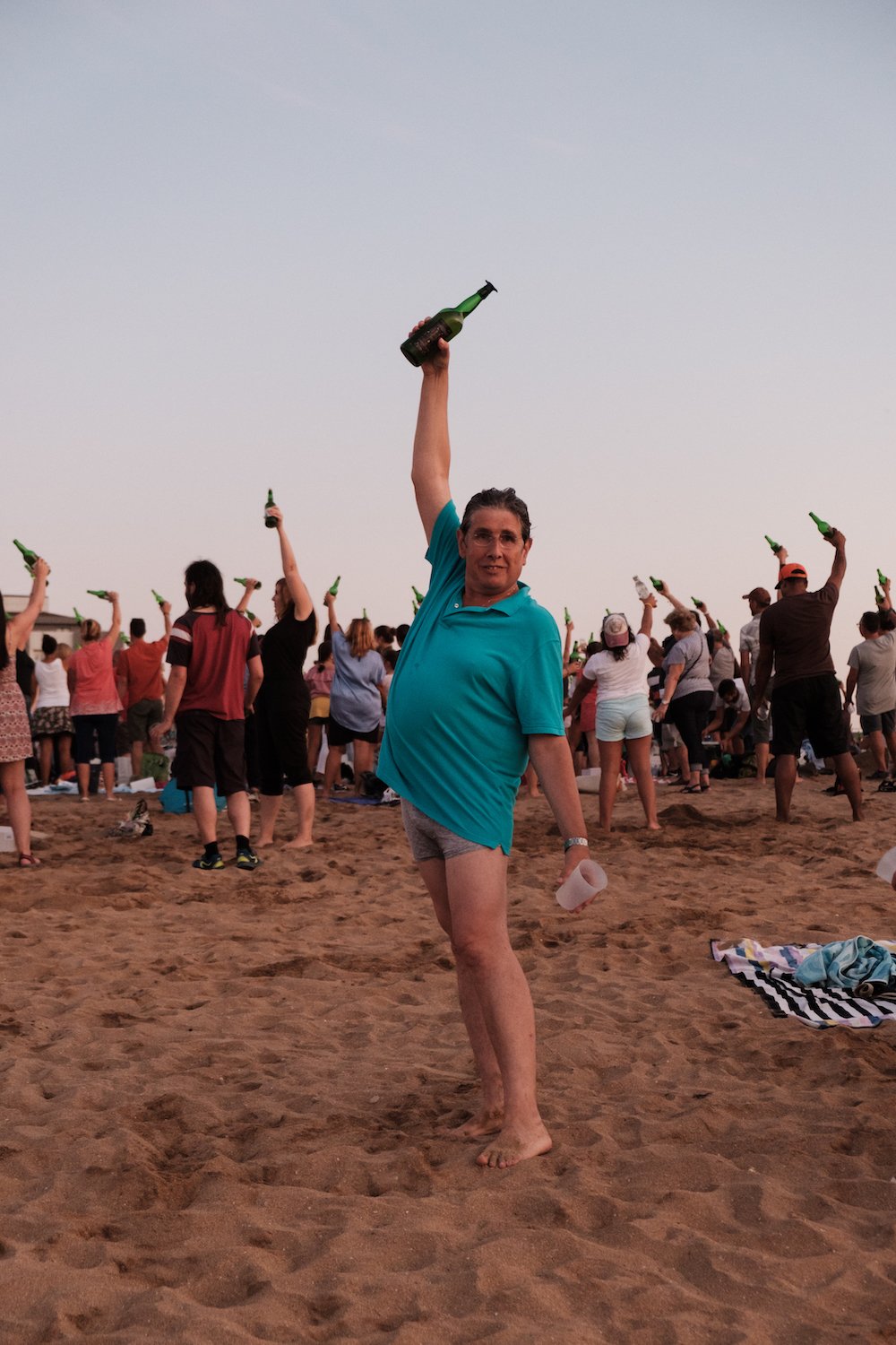 Sidra pouring world record at sunset in Gijon, Asturias, northern Spain by Ben Holbrook from DriftwoodJournals.com