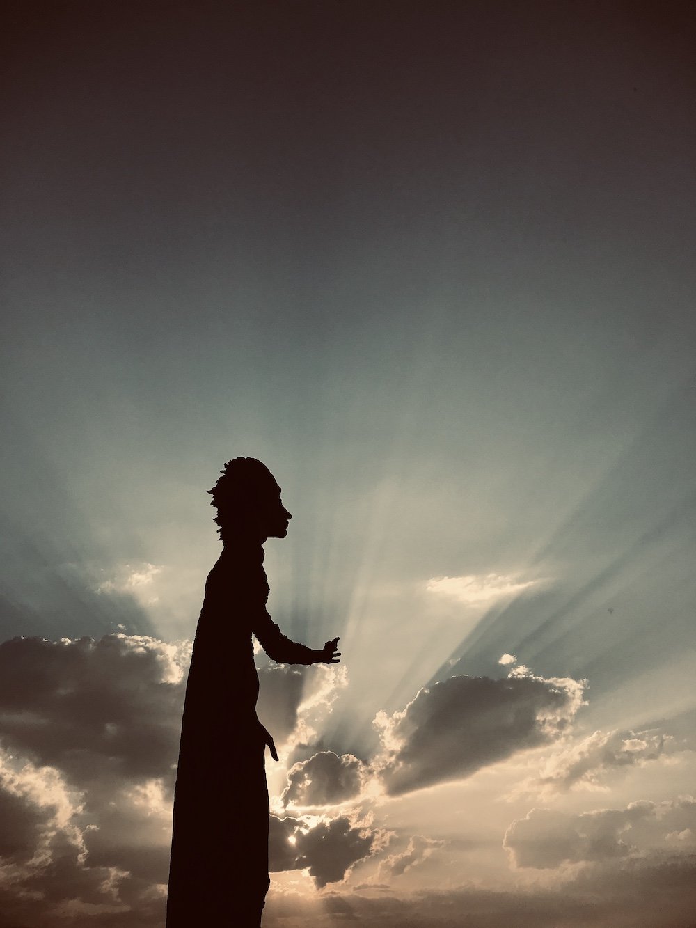 Gijon's iconic Mother of Migrants statue, bidding farewell to the many children who left Asturias in search of a better life elsewhere... by Ben Holbrook from DriftwoodJournals.com
