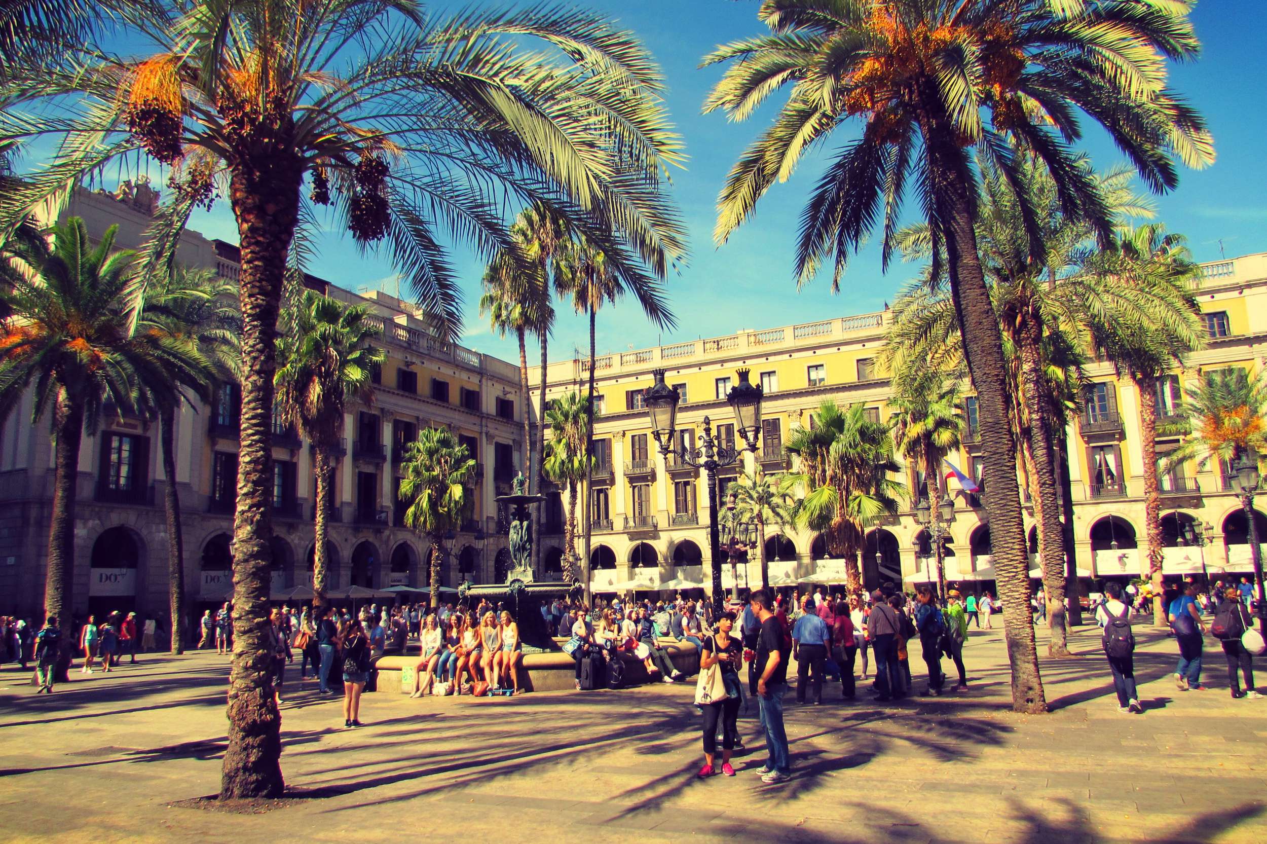 Placa Reial, a dreamlike square just off Las Ramblas and packed with restaurants, bars and clubs Gothic Quarter, Barcelona.