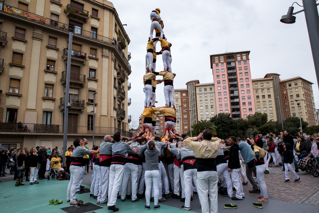It's all about coming together. Community and togetherness. Achieving something as a group that is greater than the sum of its parts. Catalan castellers (human towers) in Barcelona during La Merce- by Ben Holbrook