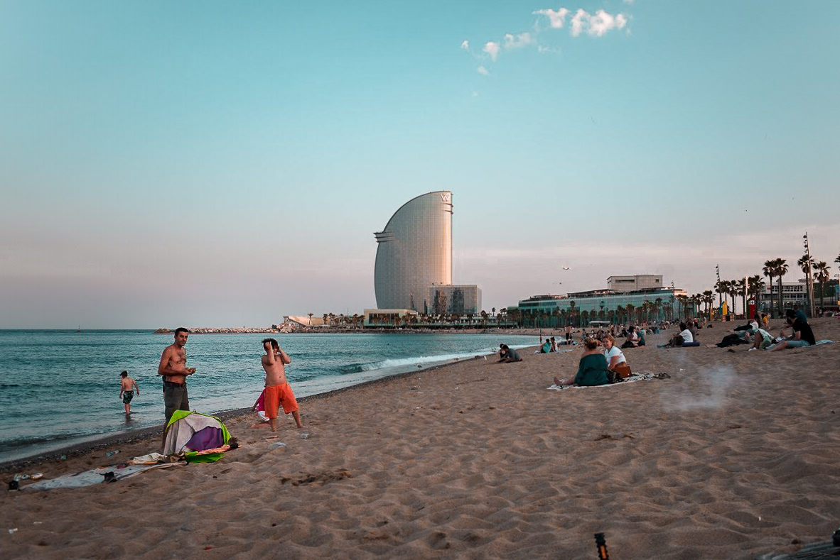 Barceloneta beach at sunset - by Ben Holbrook