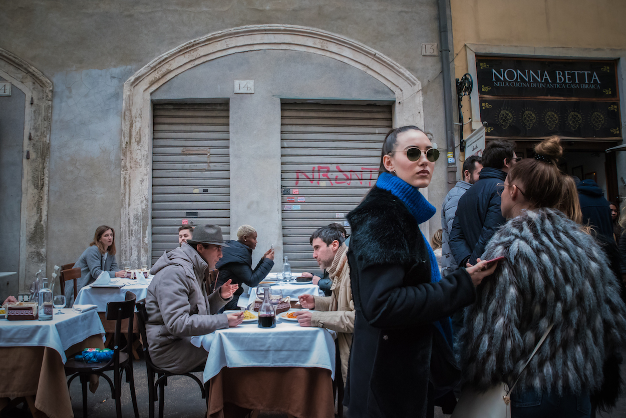 Lunchtime on Via del Portico d'Ottavia in Rome's Jewish Ghetto - by Ben Holbrook.