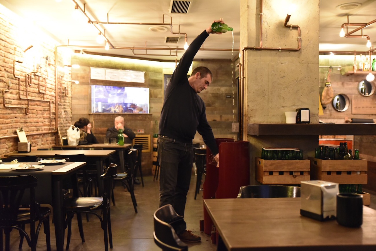 A long pour of Asturian cider