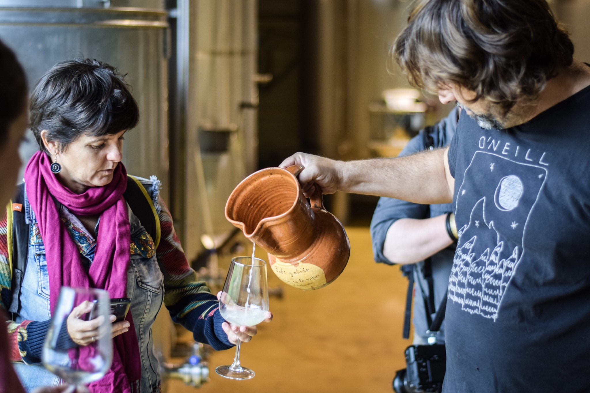 Sipping Cantabrian wine at Bodegas Vidular, Cantabria. Sipping Cantabrian wine at Bodegas Vidular, Cantabria.