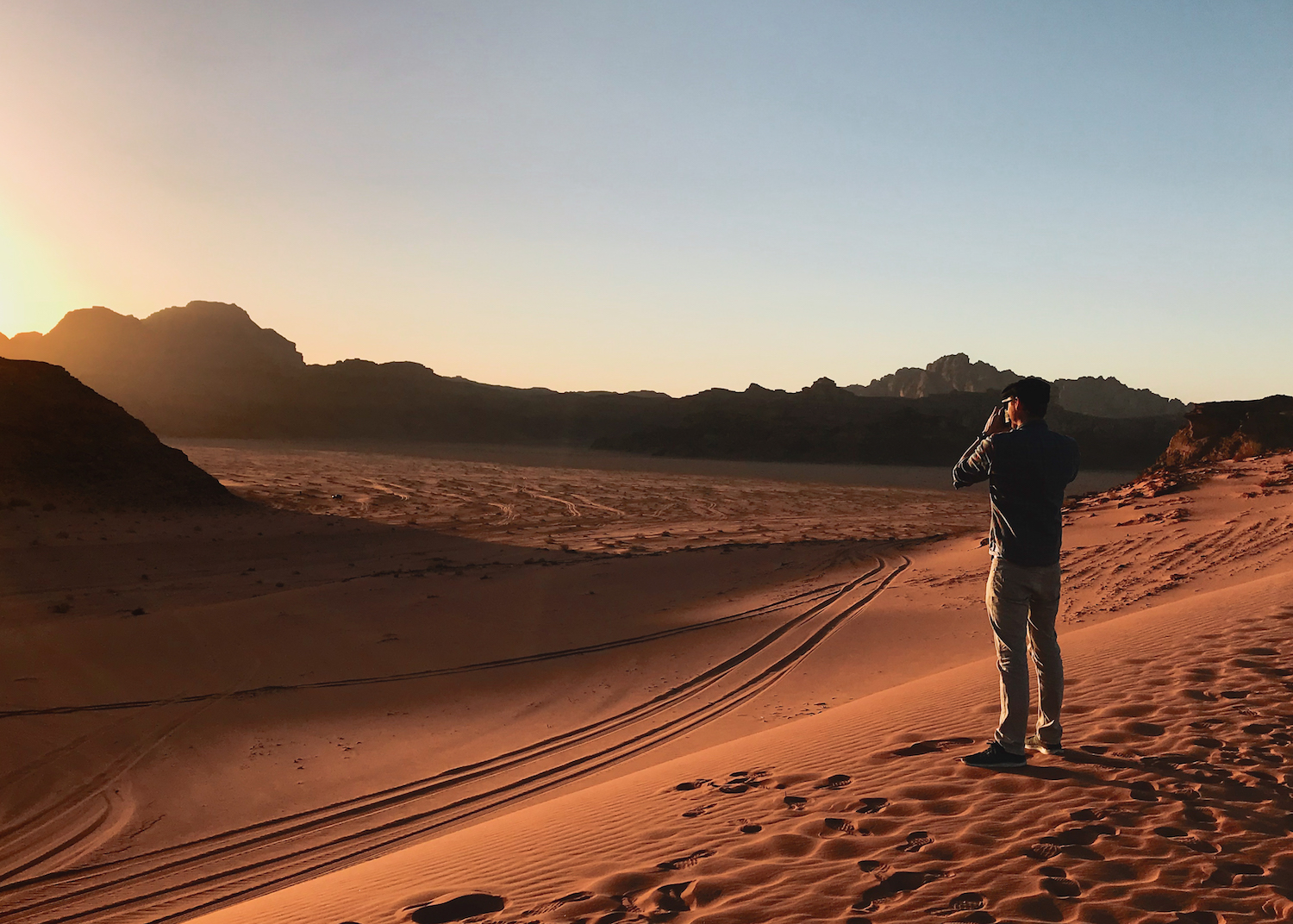 Sunset in Jordan's Wadi Rum desert - by Ben Holbrook from DriftwoodJournals.com. Sunset in Jordan's Wadi Rum desert - by Ben Holbrook from DriftwoodJournals.com.