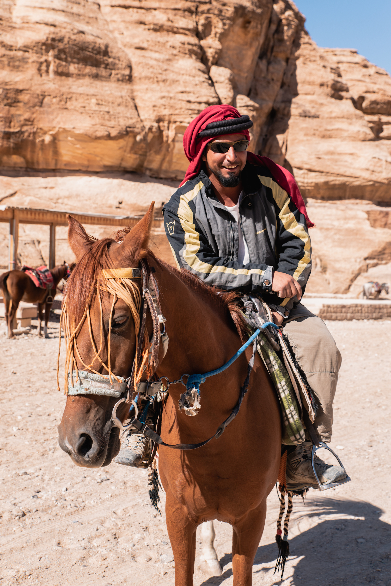 Susana and Muhammad scouting for customers to take to Petra. “She’s a beautiful horse, very strong. But the truth is that I have three horses. They can’t be out for long when the sun is very hot.” - by Ben Holbrook from DriftwoodJournals.com Susana and Muhammad scouting for customers to take to Petra. “She’s a beautiful horse, very strong. But the truth is that I have three horses. They can’t be out for long when the sun is very hot.” - by Ben Holbrook from DriftwoodJournals.com