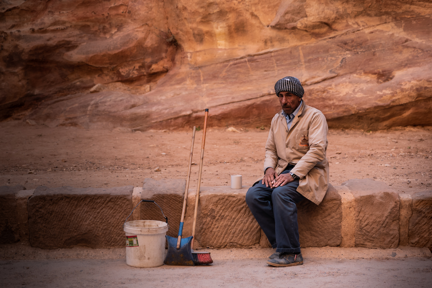 Petra groundsman stops for a smoke. - by Ben Holbrook from DriftwoodJournals.com Petra groundsman stops for a smoke. - by Ben Holbrook from DriftwoodJournals.com